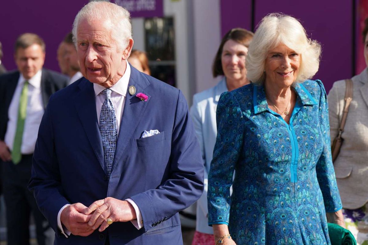 King Charles III caught roughly 'helping' Queen Camilla Parker with her coat