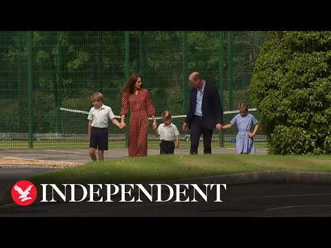 Prince Louis ignores William's offer to hold his hand as he starts first day of school